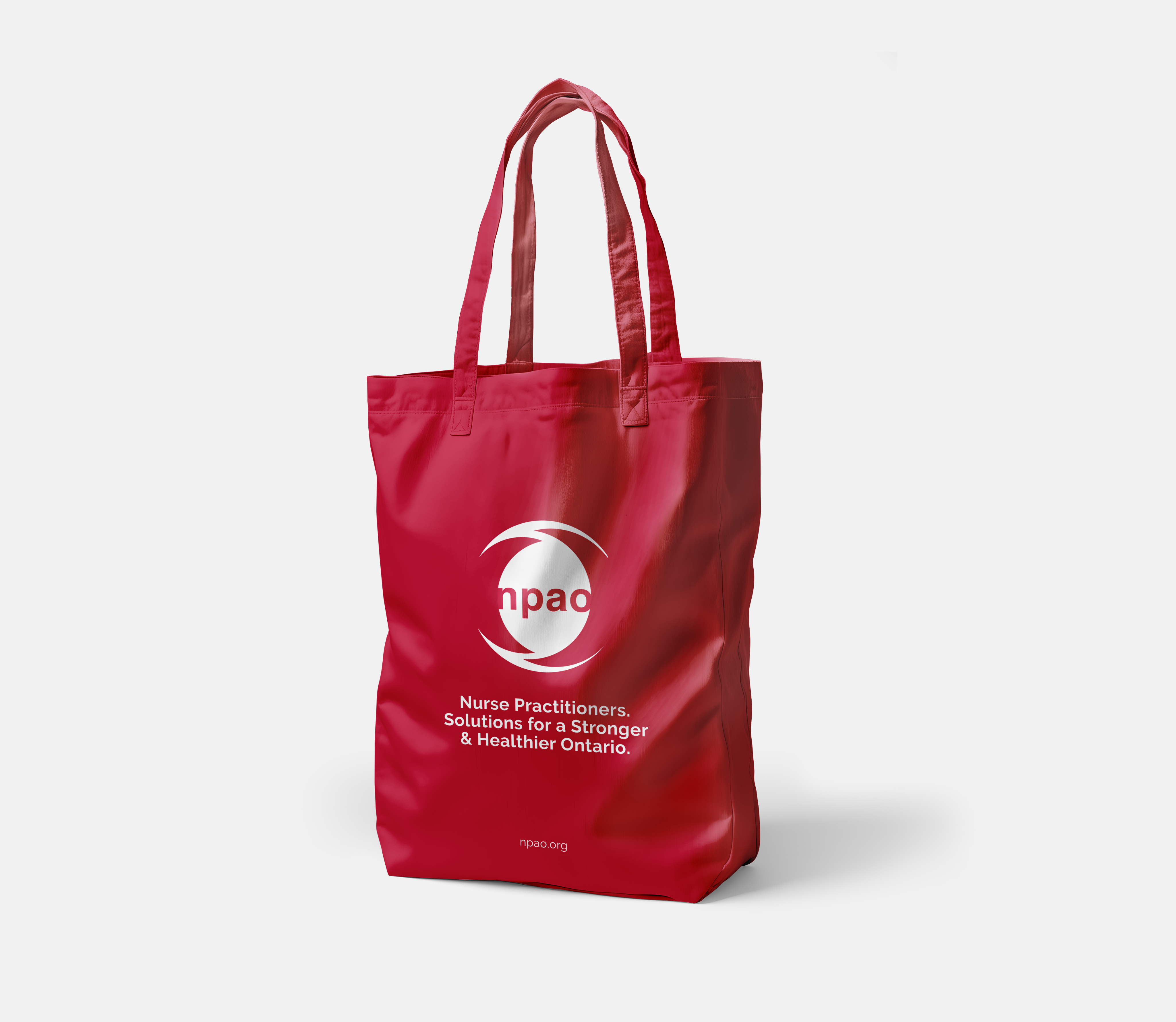 Red NPAO branded tote bag